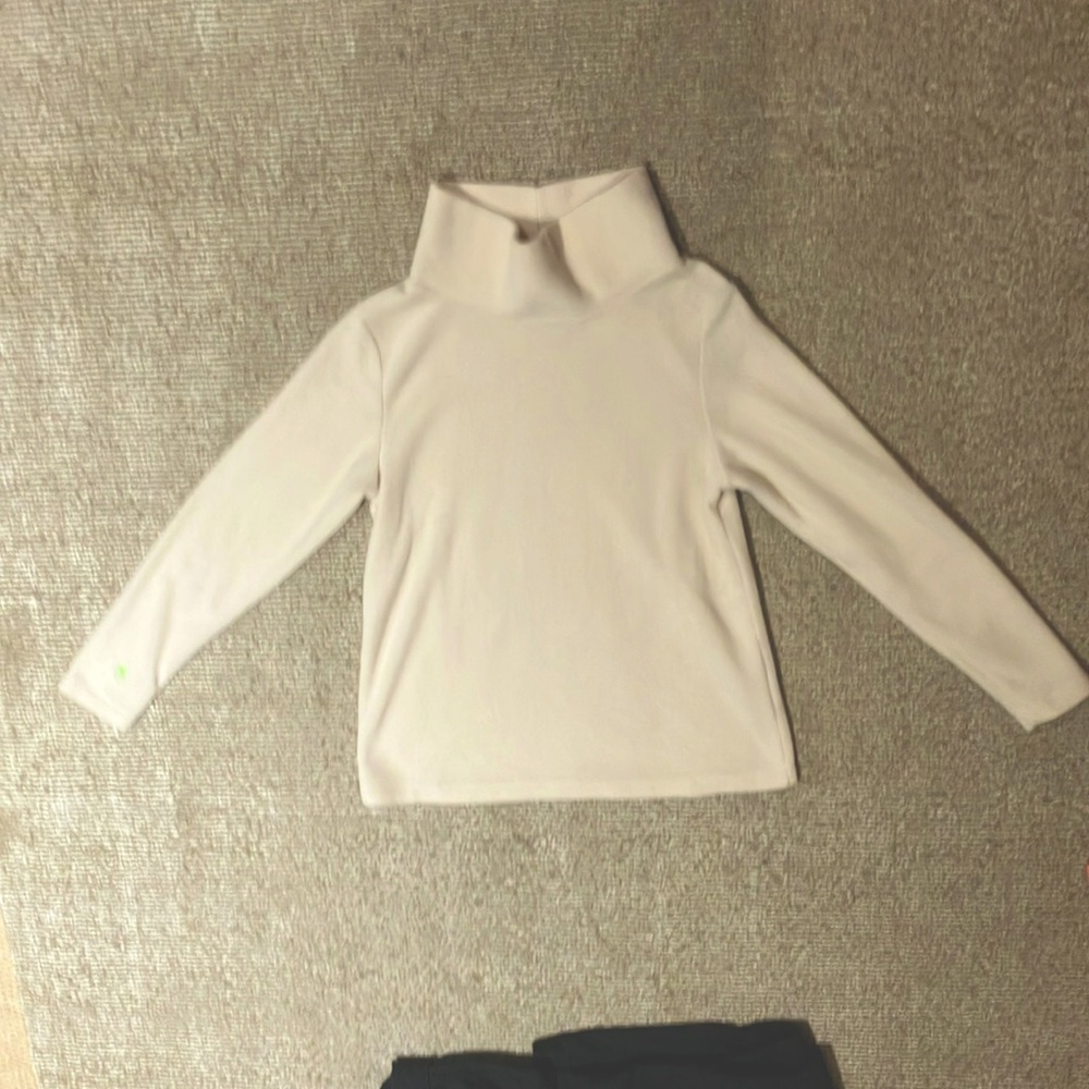 Cream Turtle Neck fleece in size medium